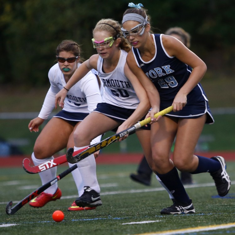 Lily Posternak, right, of York has made a verbal commitment to play field hockey at Duke University. The junior midfielder had 27 goals and 14 assists this fall.