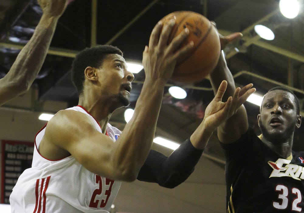 Jordan Mickey, left, scored 32 points and grabbed 13 rebounds to help the Red Claws to a victory over Nnanna Egwu, right, and the Erie BayHawks. Joel Page/Staff Photographer