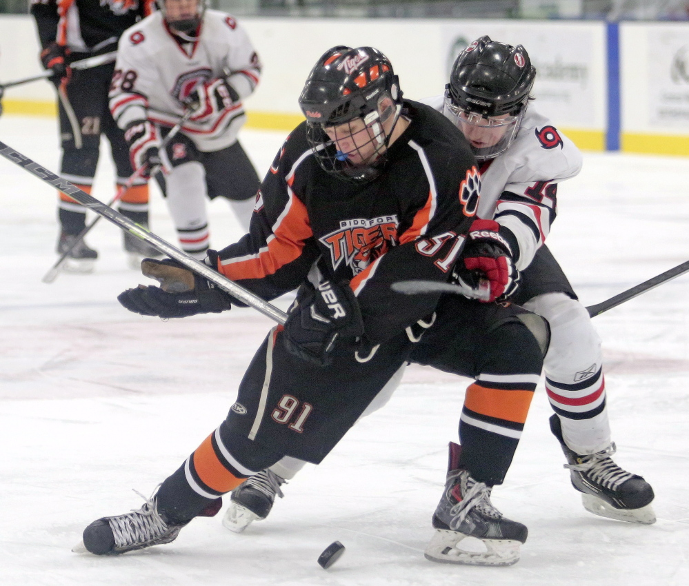 Ricky Ruck, left, and Biddeford will challenge Sean McDonald and Scarborough for supremacy in Class A. Scarborough won the Class A title last season.