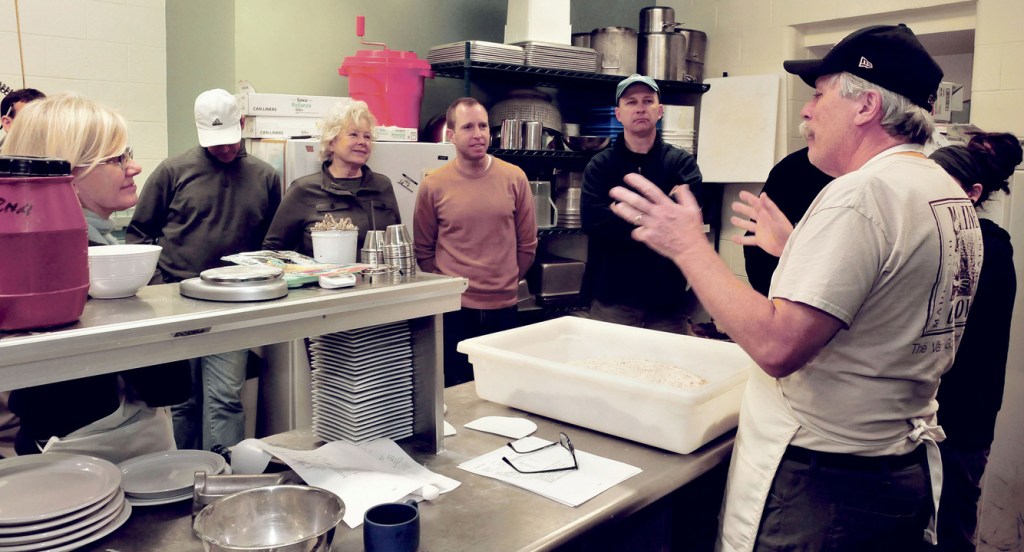 Jim Amaral, owner and founder of Borealis Breads, conducts a Maine Grain Alliance workshop on bread making to students in Skowhegan on Tuesday.
