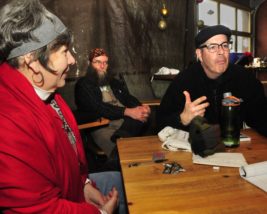 Sam Wells, right, of 168 Main Street Wood-Fired Pizza and Bakery explains his interest in baking during a workshop in Skowhegan on Tuesday. At left is Stacy Cooper of Biscuits and Company and Dusty Dowse of Maine Grain Alliance.
