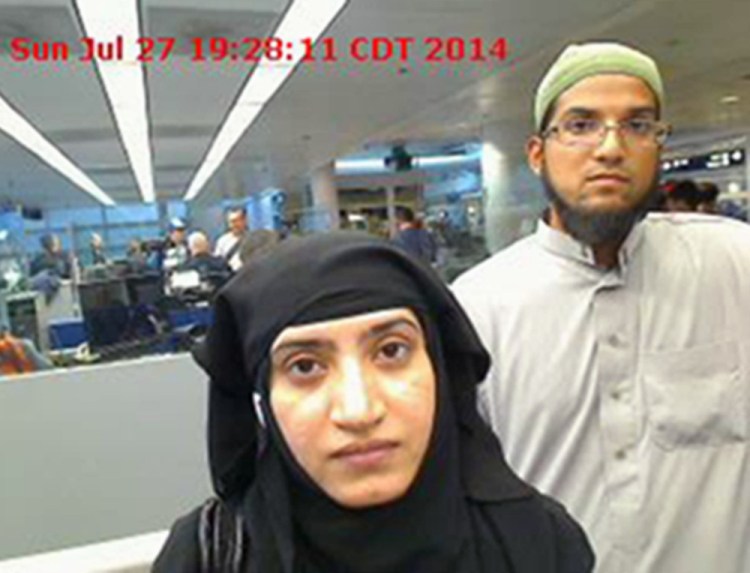 Tashfeen Malik, left, and Syed Farook in a 2014 U.S. Customs and Border Protection photo taken at O’Hare International Airport in Chicago. Via The Associated Press