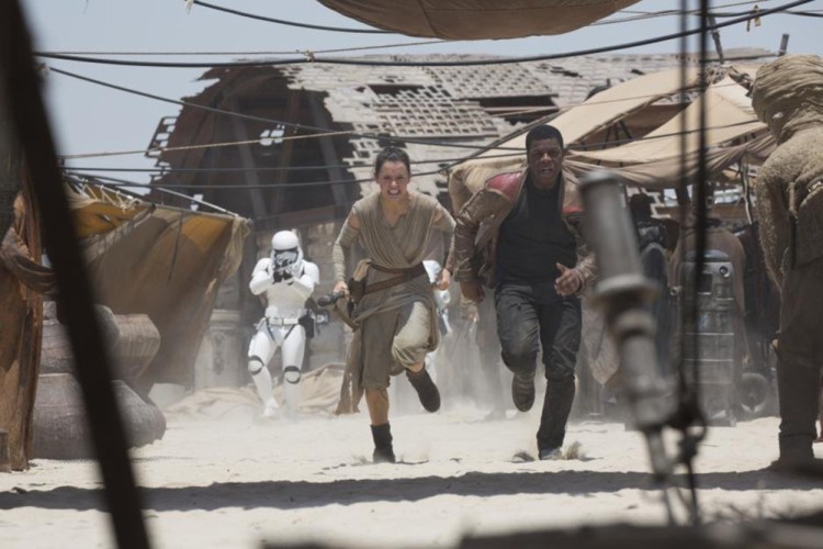 Daisy Ridley and John Boyega in “Star Wars: The Force Awakens.”