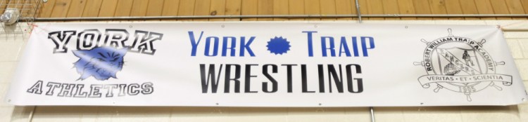 A York Traip wrestling sign is hanging this season at York High. This is the first year in which schools are allowed to create cooperative wrestling teams.