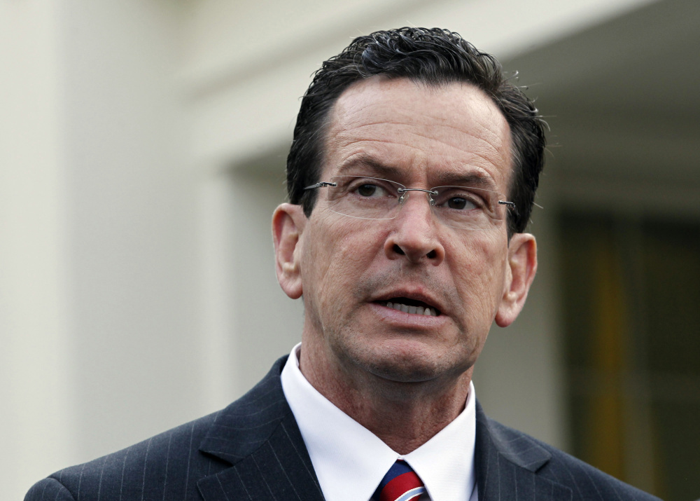 Connecticut Gov. Dannel P. Malloy said he’s issuing an executive order to deny gun permits to people on federal watch lists because “it’s the right thing to do.” 2010 Reuters file photo