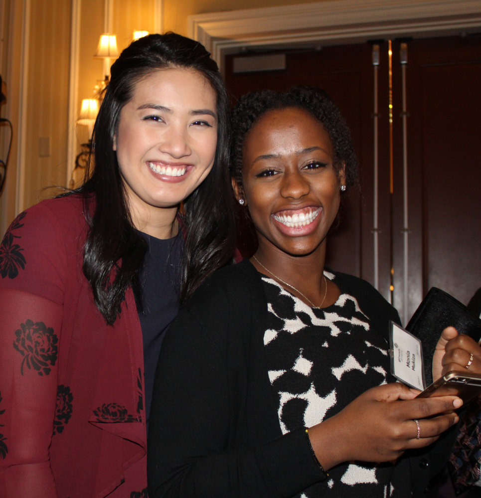 Girl Scouts alums Krylyling Oum, left, and Monia Mukiza.