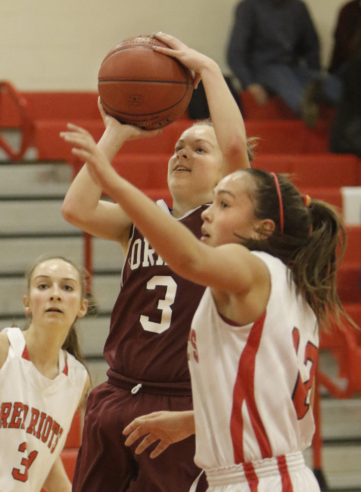 Kaylea Lundin of Gorham puts up a shot during the Rams’ 40-38 win Friday night at South Portland. The Rams used a second-half comeback to remain undefeated.