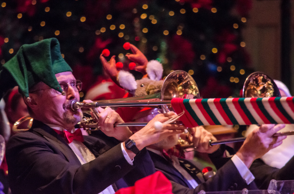 A trombone player shows his holiday spirit while playing a Christmas song during the 2014 show.