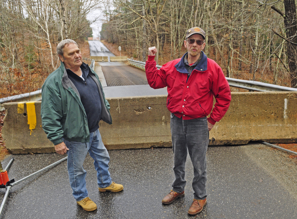 Whitefield residents Norm Best, right, and Jerry Brann agree that the Northy Bridge needs repairs, but said they feel safe on it and see no reason it should be permanently closed.