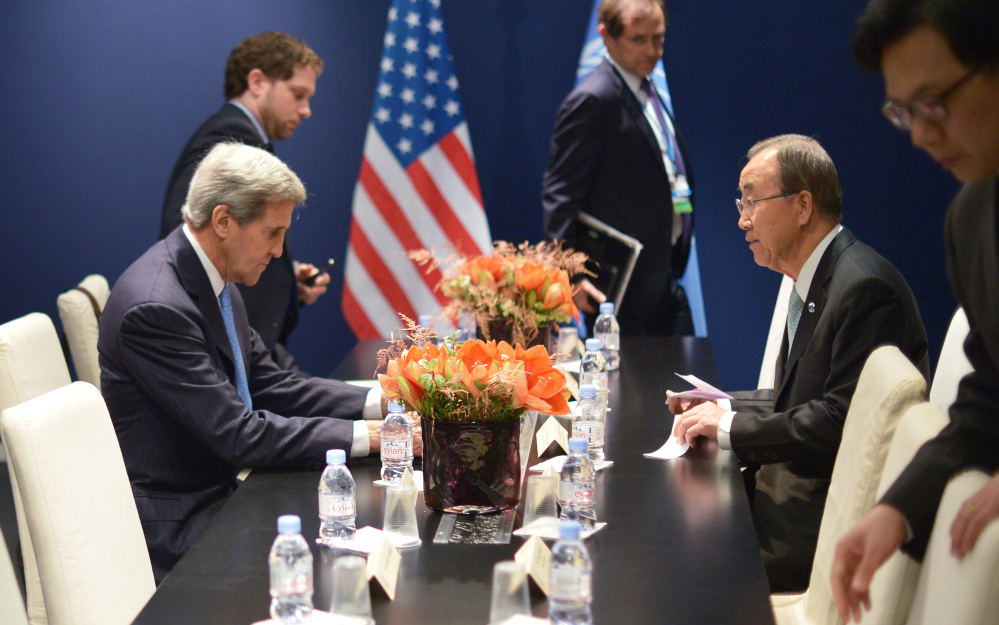 US Secretary of State John Kerry, left, and United Nations Secretary General Ban Ki-moon meet on the sidelines  of the COP 21 United Nations conference on climate change, in Le Bourget, on the outskirts of Paris on Friday Dec. 11, 2015.