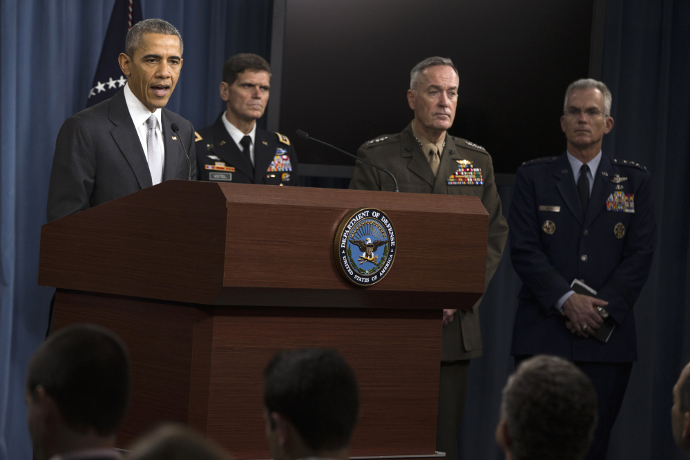 President Barack Obama speaks at the Pentagon on Monday about the fight against the Islamic State group following a National Security Council meeting. Joining the president, from the left are, Commander of U.S. Special Operations Command Gen. Joseph Votel, Joint Chiefs Chairman Gen. Joseph Dunford, and Joint Chiefs Vice Chairman Gen. Paul Selva.