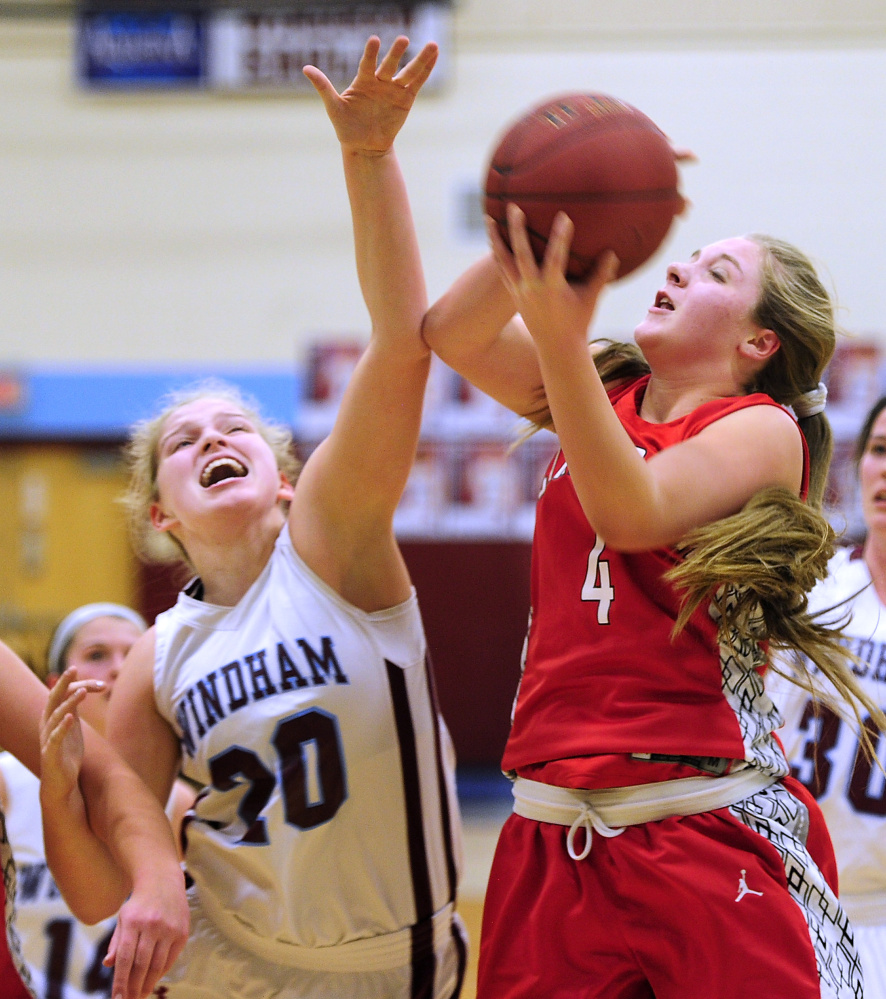 Scarborough’s Brooke Malone, right, scored nine points in the Red Storm’s victory over Sadie Nelson and Windham on Tuesday in Windham.
Gordon Chibroski/Staff Photographer
