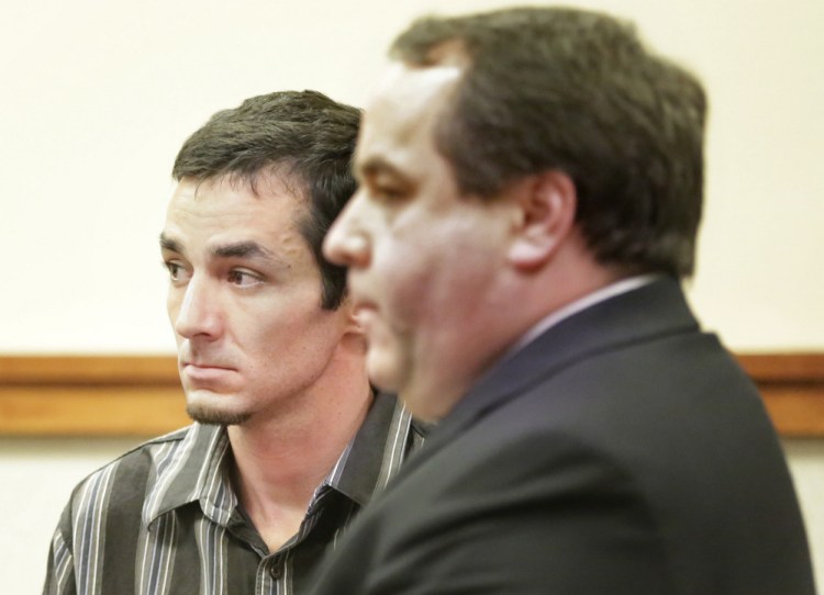 Michael Minson, left, shown at an earlier court hearing, was sentenced Wednesday in connection with a crash in Casco that killed 4-year-old Cameron Joseph Petersen. With Minson is defense attorney Robert LeBrasseur.