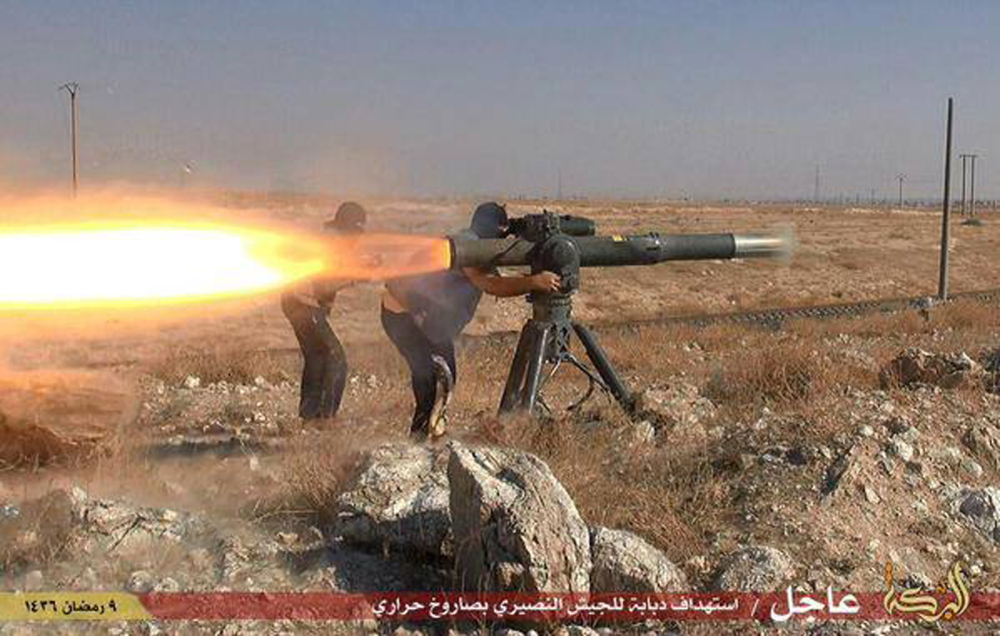 In this photo posted on an anonymous website, Islamic State militants fire an anti-tank missile in Hassakeh, northeast Syria.