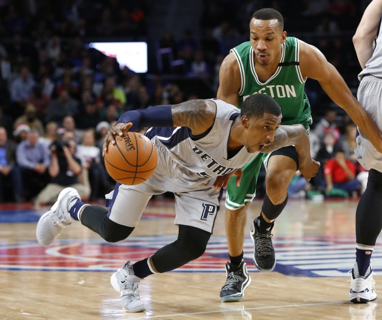 Pistons guard Kentavious Caldwell-Pope drives on Celtics guard Avery Bradley in the second half of the Pistons’ win Wednesday night.