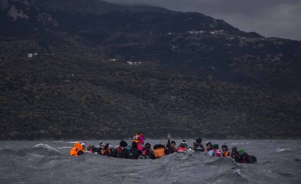 Refugees approach the Greek island of Lesbos on Thursday. According to the International Organization for Migration, 1,005,504 people have entered the EU in 2015.
