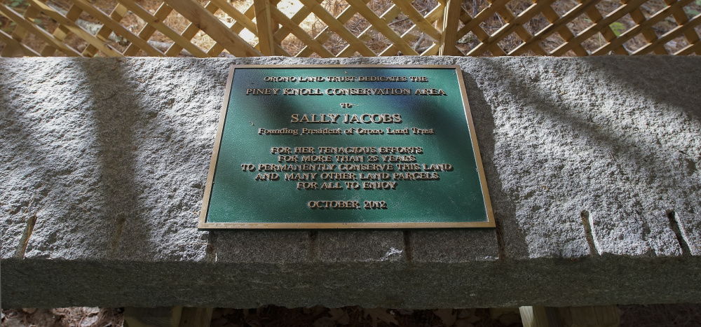 A monument dedicated to the memory of Orono Land Trust founder Sally Jacobs sits in the Piney Knoll Conservation Area in Orono.
