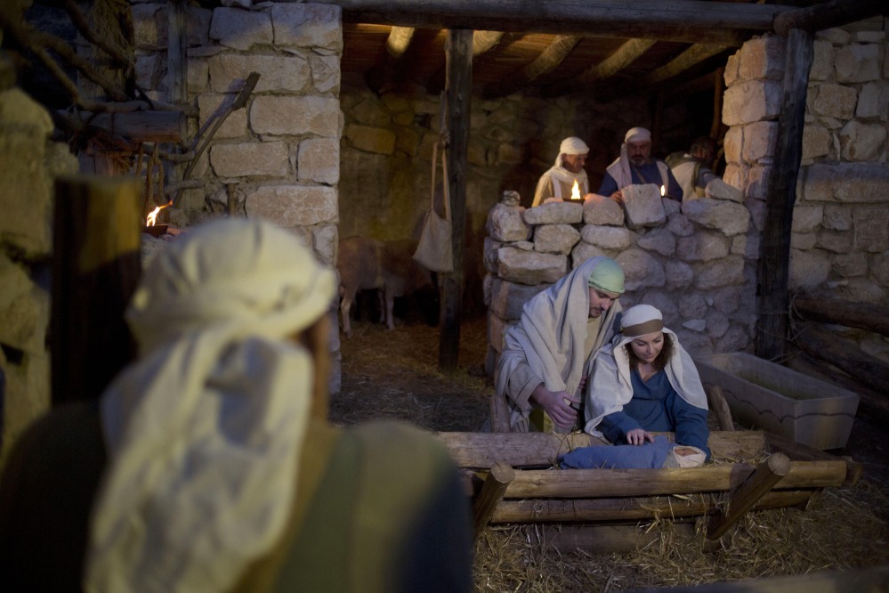 Christian actors portray Joseph and Mary during a re-enactment of the birth of Jesus Christ in the northern Israeli city of Nazareth on Tuesday. The biblical story has a message that’s important to all Americans – whether or not they are religious.