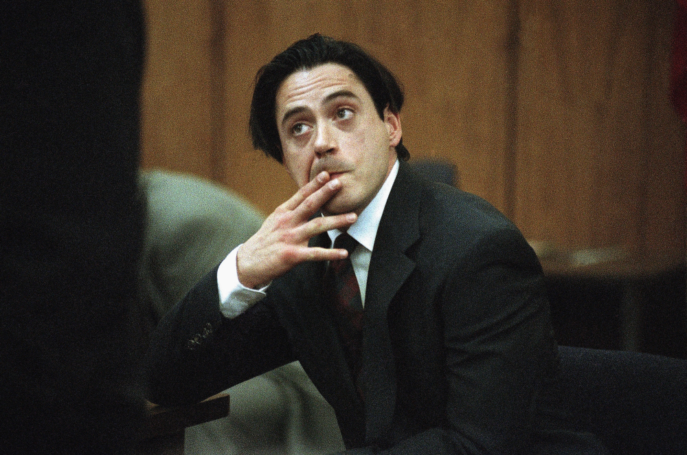 Robert Downey Jr. listens in a Malibu, Calif., courtroom during his 1997 sentencing for violating parole on a prior drug conviction.