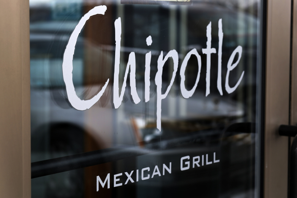 A Chipotle restaurant near Boston College has reopened several weeks after 136 patrons fell ill with norovirus.