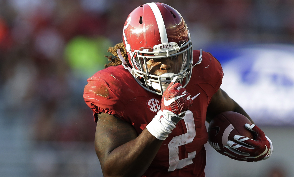 Alabama’s Derrick Henry rushes for a touchdown against Middle Tennessee on Sept. 12. The Heisman Trophy winner was just getting started, as the bulldozing back had a Southeastern Conference-record 1,986 rushing yards.
