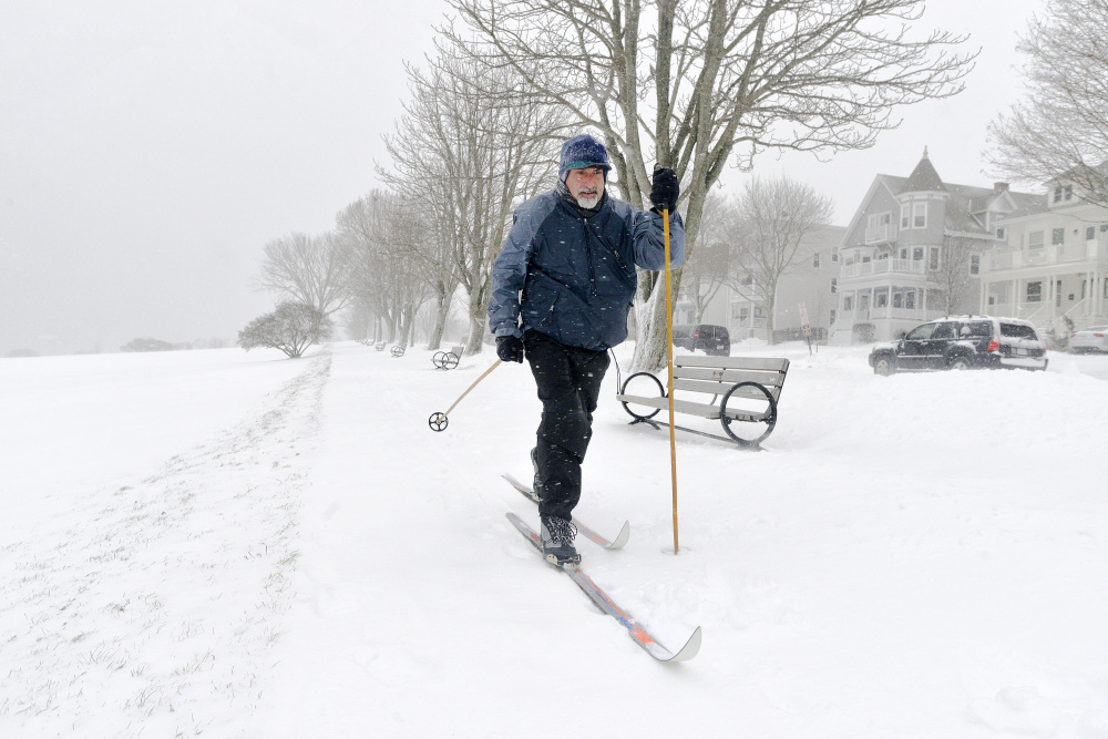 The area’s first snowstorm brought people out to play as well as to shovel. Brian O’Connor of Portland donned his cross-country skis for the first time this season and ventured out onto the Eastern Prom.