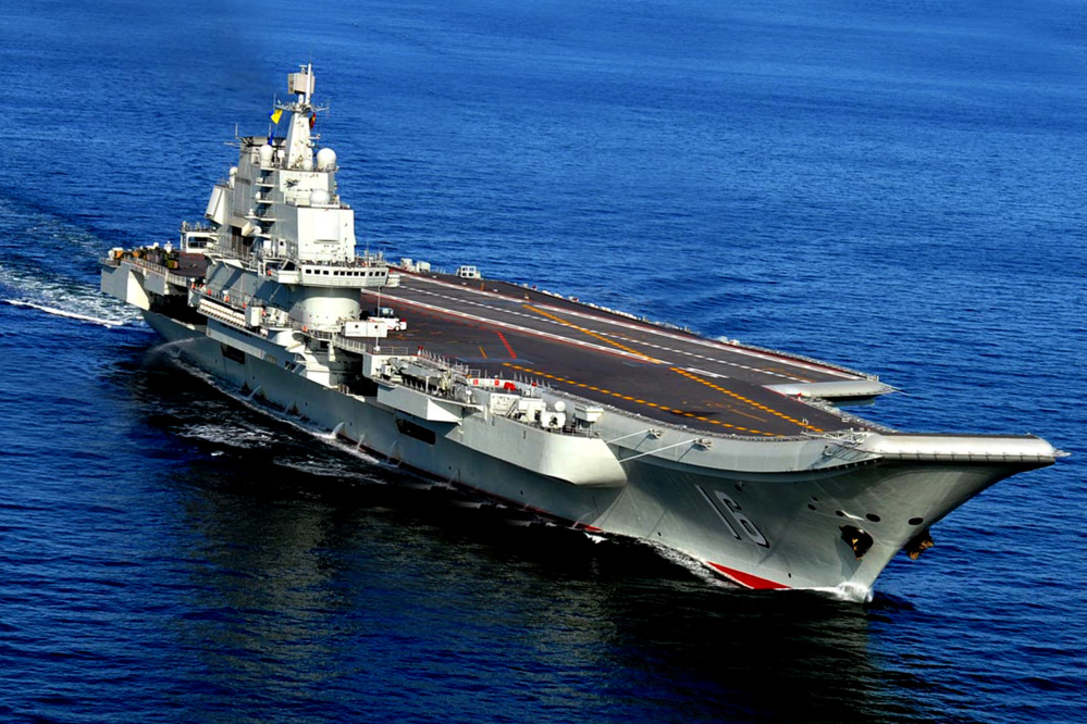 The Liaoning, China’s first aircraft carrier, sails in the sea near Qingdao in eastern China’s Shandong province. China’s Defense Ministry spokesman Col. Yang Yujun told reporters at a news conference Thursday that China is building a second aircraft carrier, this time entirely with domestic technology.