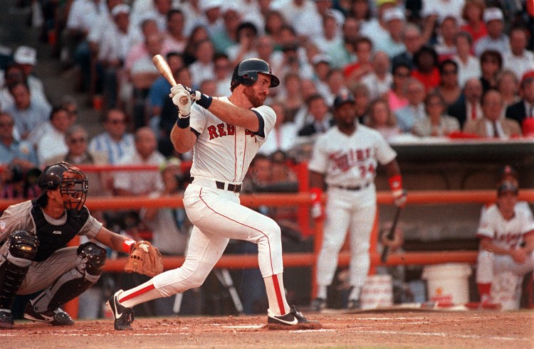 Boston's Wade Boggs smacks a first-inning  home run July 11, 1989 against National League pitcher Rick Reuschel in the All-Star game in Anaheim, Calif. Moments earlier, Reuschel delivered a homer to Kansas City's Bo Jackson. The Associated Press