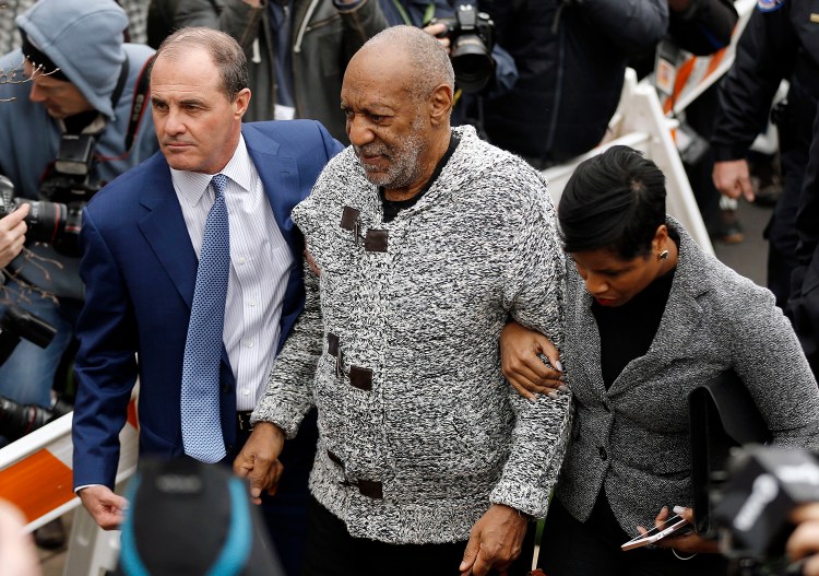 Bill Cosby arrives at court to face a felony charge of aggravated indecent assault  Wednesday, in Elkins Park, Pa. Cosby was charged Wednesday with drugging and sexually assaulting a woman at his home 12 years ago. The Associated Press
