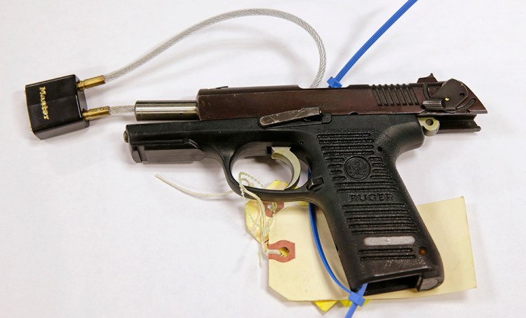The Ruger pistol presented as evidence during the federal trial of Boston Marathon bomber Dzhokhar Tsarnaev. Authorities said the gun was used to kill MIT police officer Sean Collier. The Associated Press