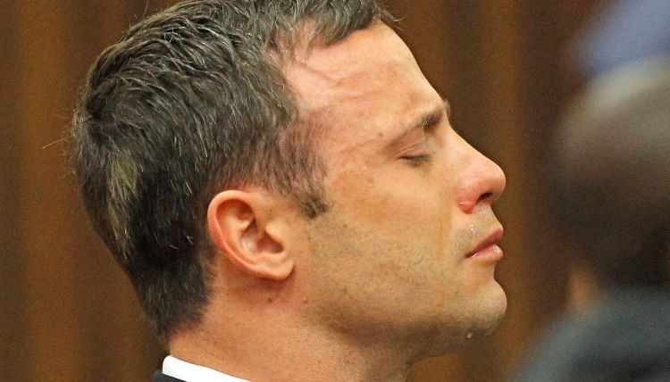 Oscar Pistorius reacts as Judge Thokozile Masipa rules out a murder conviction in this Sept. 11, 2014, photo. On Thursday, Justice Lorimer Eric Leach of the Supreme Court of Appeal delivered a ruling  that Pistorius "ought to have been found guilty of murder on the basis that he had fired the fatal shots with criminal intent." 