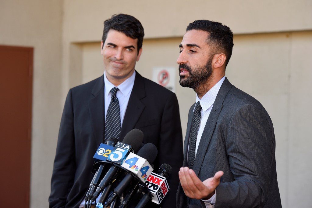 David Chesley, left, and Mohammad Abuershaid, attorneys for the family of Syed Farook, speak to reporters Friday in Los Angeles. They said Farook's mother, who lived with him and his wife, never saw any of the weapons or bombs that authorities found.
The Associated Press