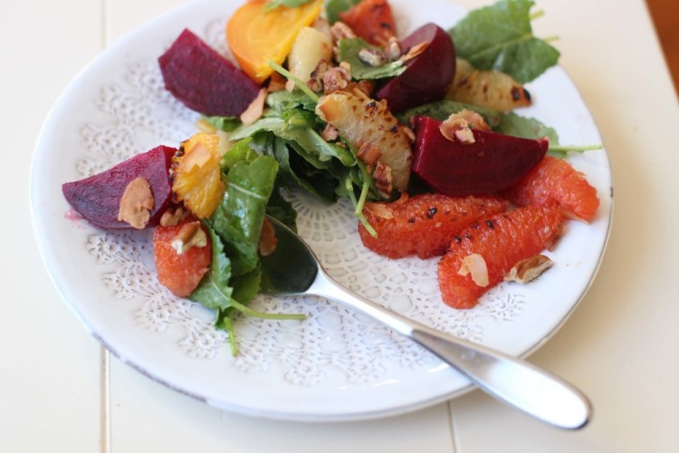Add roasted beets and lightly charred citrus segments to nicely dressed greens for a robust salad.
