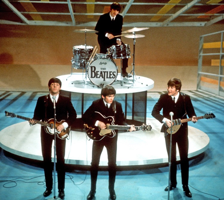 The Beatles perform on the CBS "Ed Sullivan Show" in this Feb. 9, 1964, photo. The Associated Press