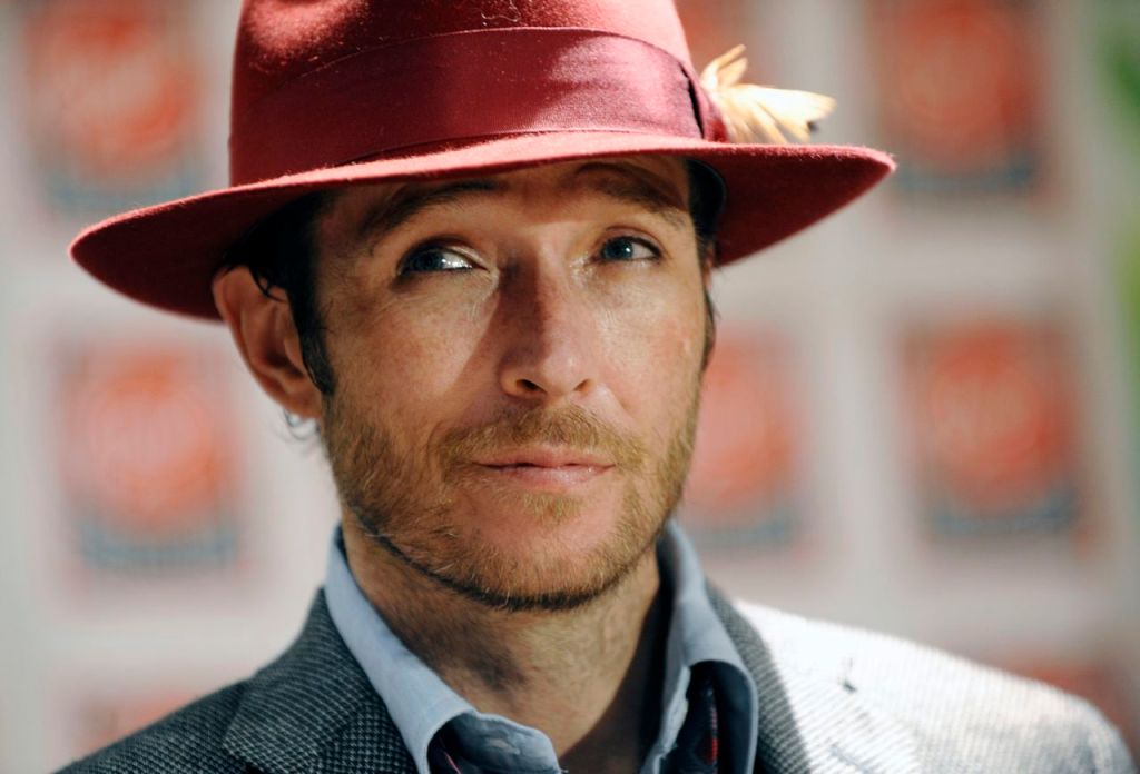 Scott Weiland poses before signing copies of his new album, "Happy in Galoshes" in this Nov. 24, 2008, photo. The Associated Press