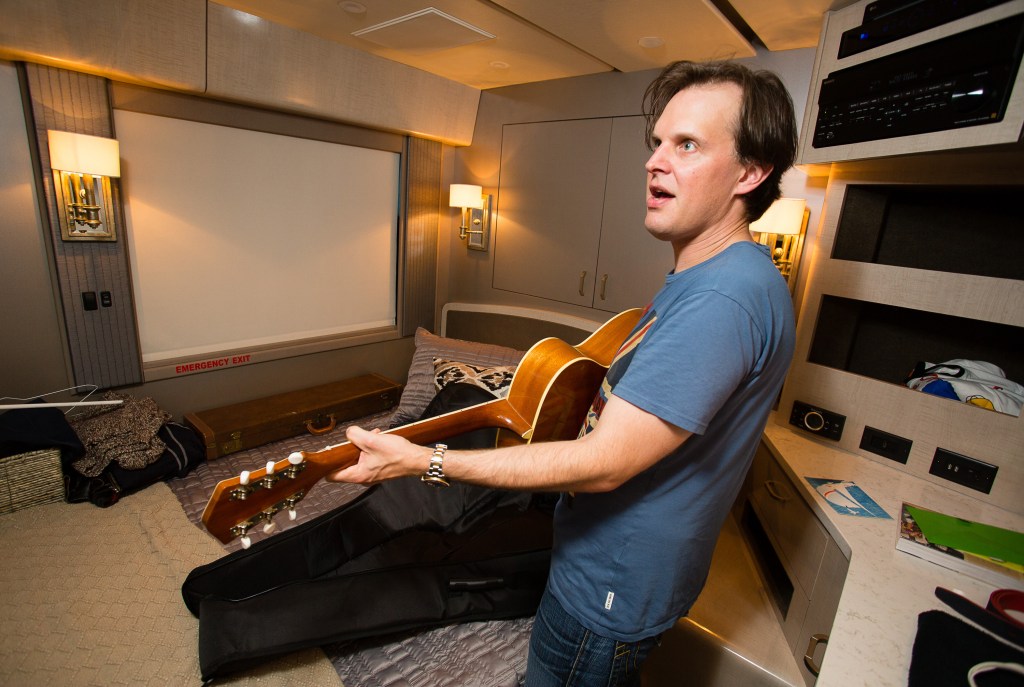 Joe Bonamassa fiddles with a guitar from his collection, a 1966 Gibson Trini Lopez, during his visit to Bangor last summer.
Photo for The Washington Post by Carl D. Walsh