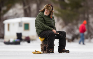 NORTH WATERBORO, ME - JANUARY 26: Al Bates, 81 of Alfred, watches a trap while jigging for fish at Little Ossipee Lake in North Waterboro on Tuesday January 25, 2016. “I’ve got some good ones here in the past, but its the first time I’ve fished here this year because of the ice, said Bates. (Photo by Carl D. Walsh/Staff Photographer)