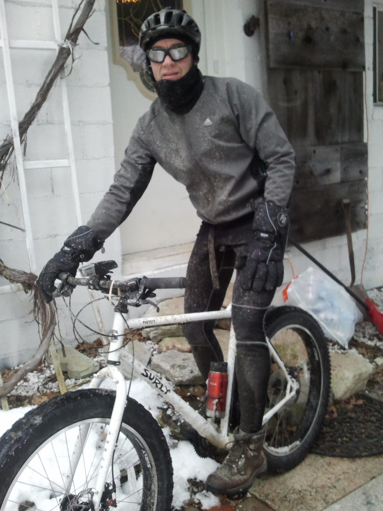 Brian Edwards of Raymond commutes to work by bike year-round. In winter he makes the 
25-mile round-trip ride on bikes with fat, studded tires. Kelly Edwards photo 