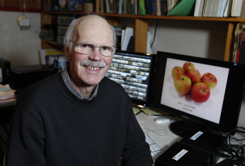 Filmmaker Huey Coleman, seen in his editing room in Portland, recently released a short documentary about the Maine Heritage Orchard, which is meant to preserve special and rare fruit varieties traditionally grown in Maine.