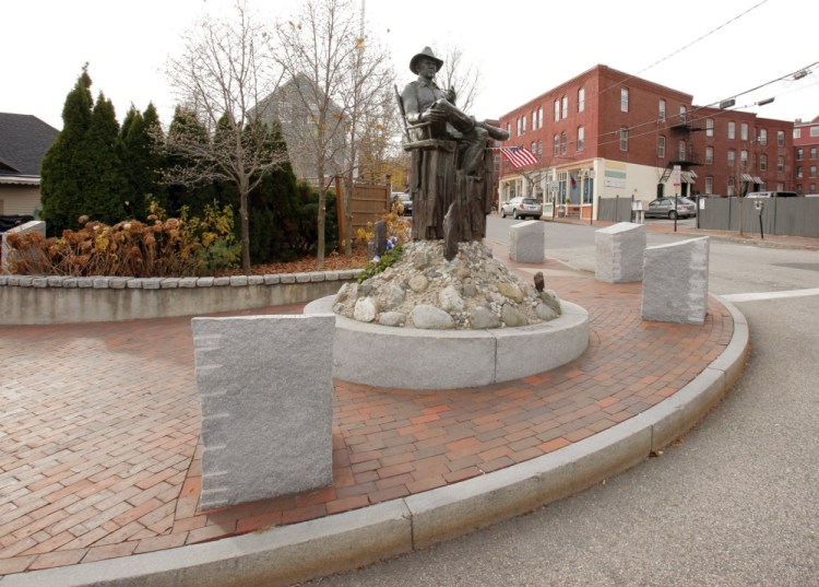 A reader notes that a tribute to John Ford, displayed at Gorham’s Corner alongside this statue of the director, is one of several public monuments in Portland whose wording includes errors.