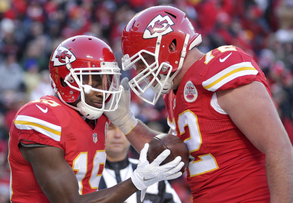 Wide receiver Jeremy Maclin, left, and offensive tackle Eric Fisher helped the Chiefs win 10 straight games after starting the season 1-5. Kansas City is a three-point favorite to beat Houston in their wild-card matchup.