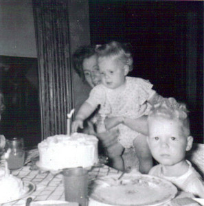 June Paulsen, seen with daughter Beth and son David, made this cake in 1954 for her little girl’s first birthday. 