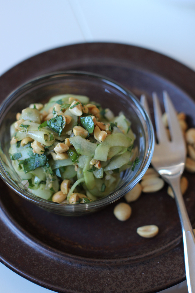 Thai cucumber salad features crunchy cucumbers enhanced with just a bit of citrus, soy sauce and a few other Thai ingredients. (AP Photo/Matthew Mead)
