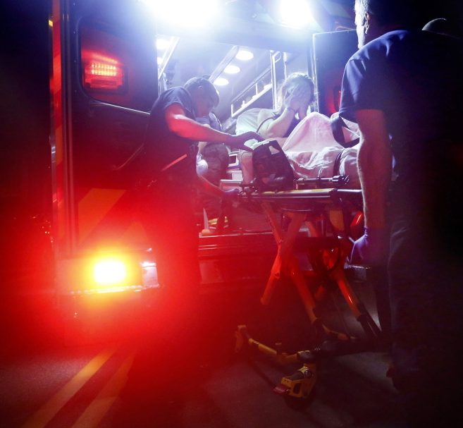 Portland paramedics load a woman into an ambulance . in 2015 after administering Narcan to revive her following a heroin overdose. 