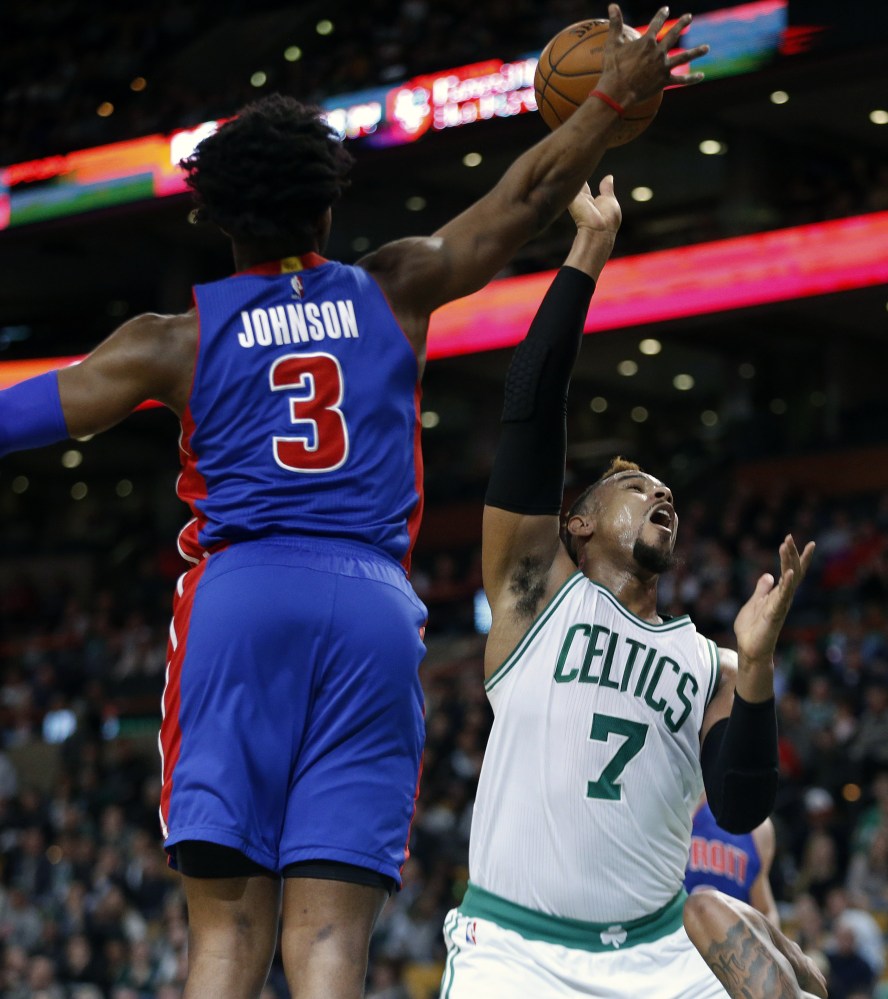 Detroit’s Stanley Johnson blocks a shot by Jared Sullinger in the second quarter Wednesday night. The Celtics built a lead but let it slip away and lost, 99-94.