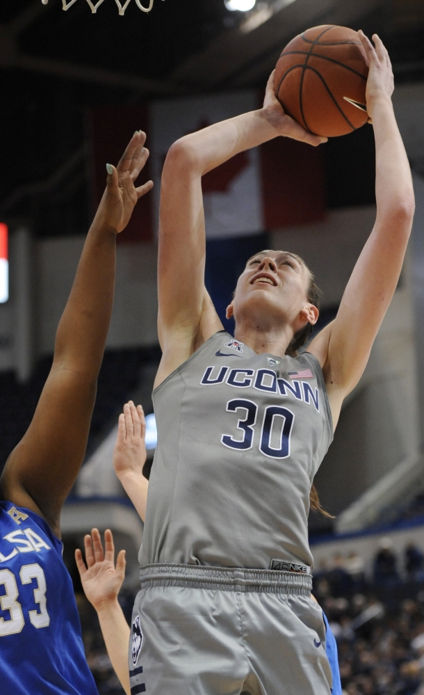 Connecticut’s Breanna Stewart goes up for a shot in the first half of the Huskies’ 95-35 win over Tulsa at home on Wednesday night, the team’s 49th straight victory.