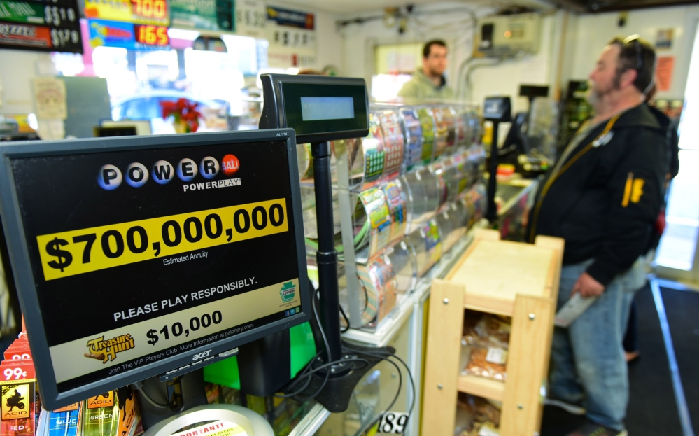 Jerry Clark buys Powerball lottery tickets Thursday at Bill’s Kwik Chek in Chambersburg, Pa.