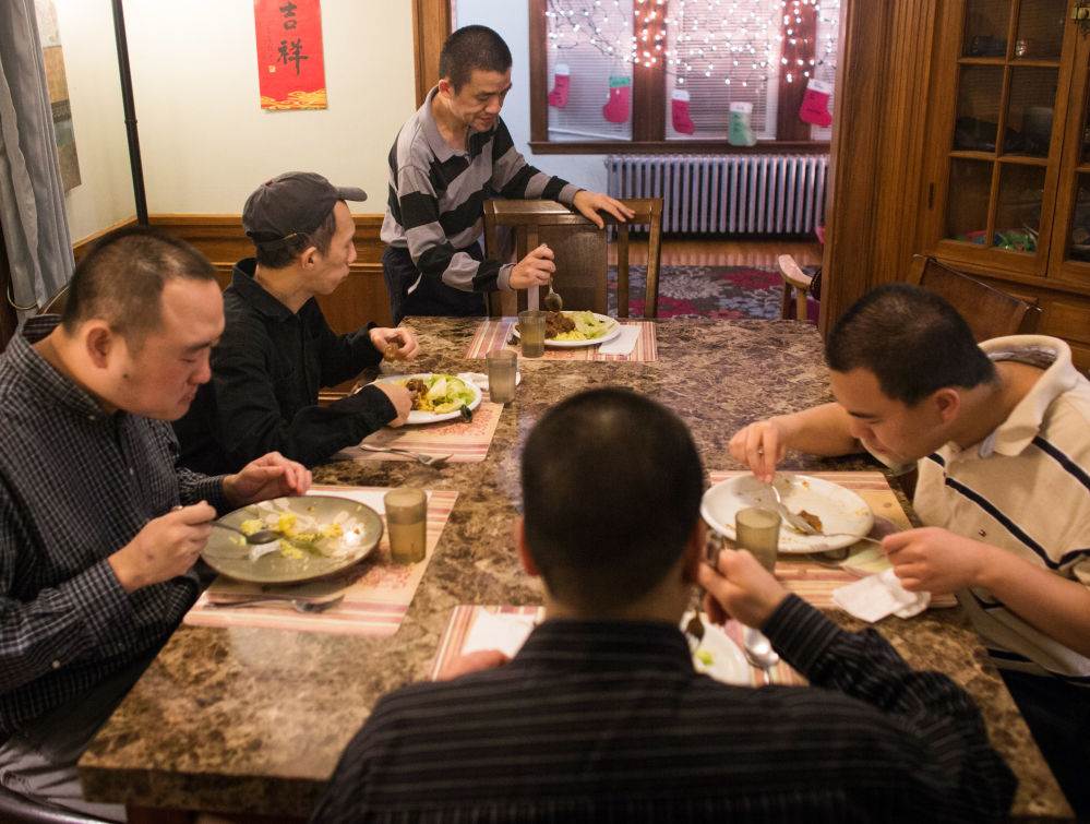 Group home residents share Asian-themed meals. Family members say their children feel at ease here, and nationally more disabled housing accommodates specific cultures.