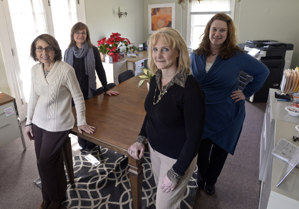 Deb DelVecchio-Scully, front left, Melissa Glaser, front right, Catherine Galda, back left and Margot Robins are working on a long-term plan for Newtown, Conn., after a federally funded trauma team that helped people deal with the Sandy Hook shootings wraps up its work.
