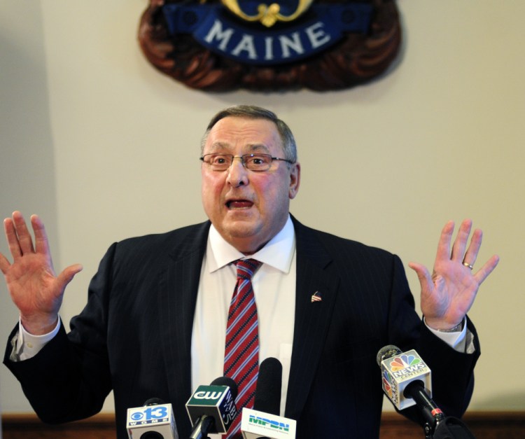 Maine Gov. Paul LePage speaks Friday in the State House cabinet room in Augusta. He said he wasn’t “smart enough” to deliberately tap old racial tensions about black men and white women, instead shifting the blame toward his critics and the media. (Joe Phelan/Kennebec Journal)
